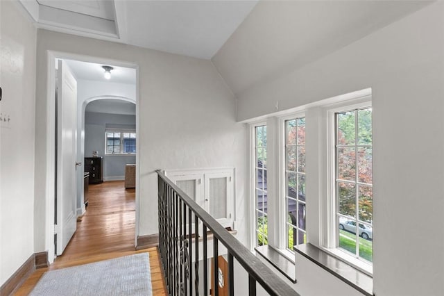 234 Orchard Dr, Mt Lebanon, PA 15228 - hall with arched walkways, wood finished floors, and lofted ceiling