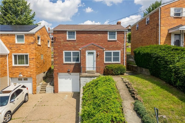 108 Bellanca Ave, Brentwood, PA 15227 - view of front of property with concrete driveway, a garage, and brick siding
