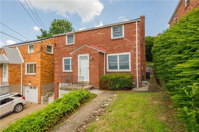 108 Bellanca Ave, Brentwood, PA 15227 - view of property with brick siding and a garage