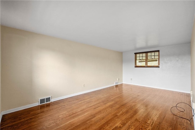 108 Bellanca Ave, Brentwood, PA 15227 - spare room featuring wood finished floors and baseboards