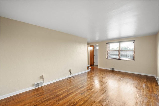 108 Bellanca Ave, Brentwood, PA 15227 - spare room featuring wood finished floors and baseboards