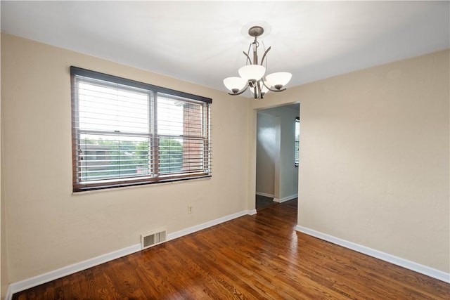 108 Bellanca Ave, Brentwood, PA 15227 - empty room featuring a chandelier and wood finished floors