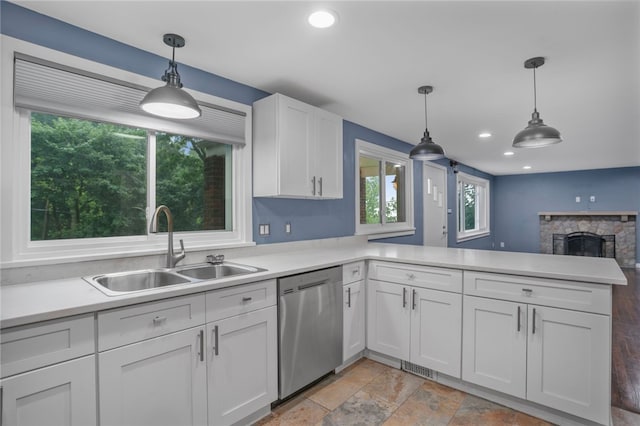 1809 Rosedale St, Verona, PA 15147 - kitchen featuring stainless steel dishwasher, a peninsula, white cabinets, light countertops, and recessed lighting