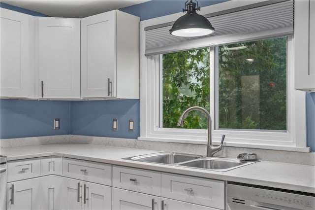 1809 Rosedale St, Verona, PA 15147 - kitchen featuring white dishwasher, white cabinets, and light countertops