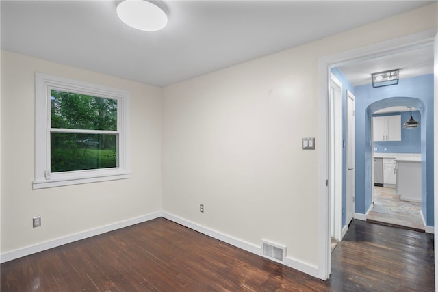 1809 Rosedale St, Verona, PA 15147 - spare room with wood finished floors and arched walkways