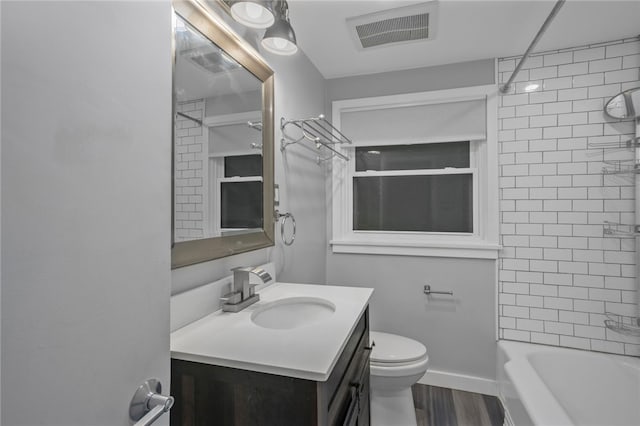 1809 Rosedale St, Verona, PA 15147 - full bathroom with vanity, wood finished floors, and bathing tub / shower combination