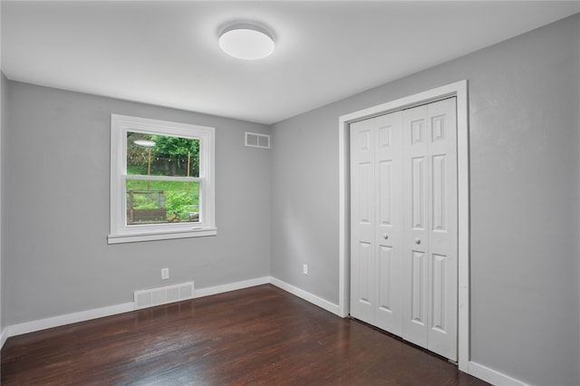1809 Rosedale St, Verona, PA 15147 - unfurnished bedroom featuring dark wood finished floors and a closet