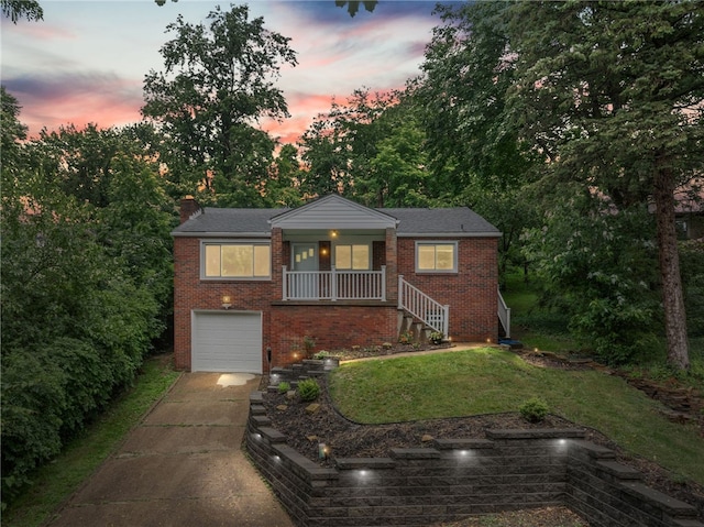 1809 Rosedale St, Verona, PA 15147 - view of front facade featuring driveway, a garage, brick siding, stairs, and a front lawn