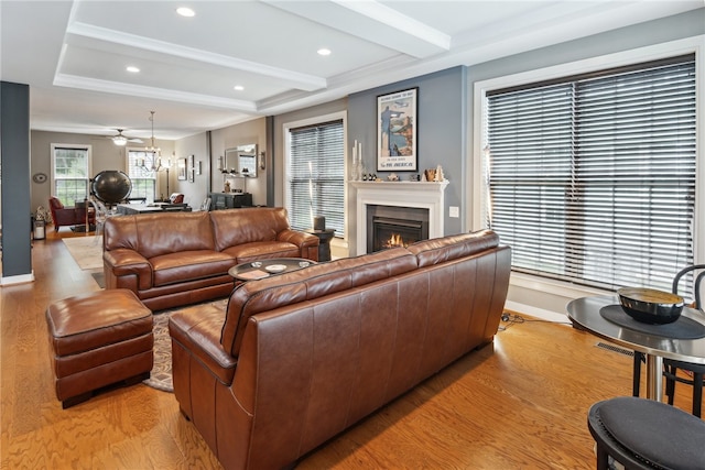 900 Thorn St, Sewickley, PA 15143 - living room featuring a warm lit fireplace, light wood-type flooring, beam ceiling, ceiling fan, and recessed lighting