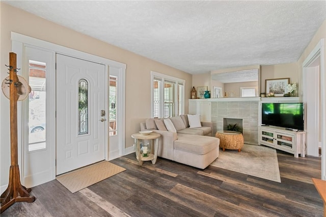 811 Bayridge Ave, Brookline, PA 15226 - entryway featuring dark wood-type flooring, a textured ceiling, and a fireplace