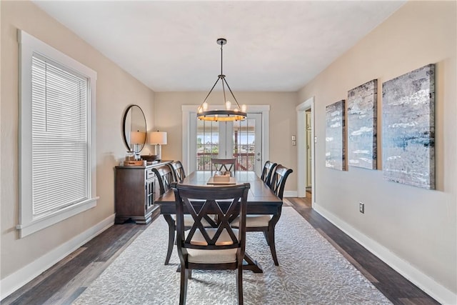 811 Bayridge Ave, Brookline, PA 15226 - dining space with a chandelier and dark wood-style floors