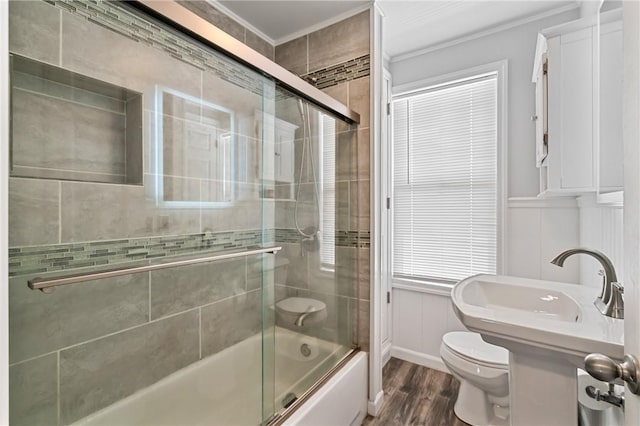 811 Bayridge Ave, Brookline, PA 15226 - full bathroom featuring combined bath / shower with glass door, wood finished floors, and crown molding