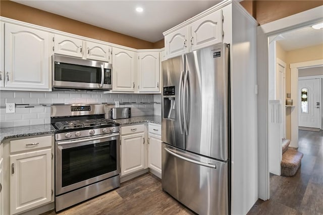 811 Bayridge Ave, Brookline, PA 15226 - kitchen featuring stainless steel appliances, light stone counters, dark wood finished floors, and recessed lighting