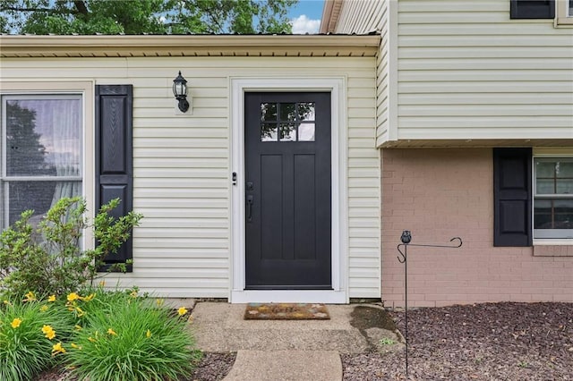 328 Chestnut Dr, Center Twp, PA 16001 - view of exterior entry with brick siding
