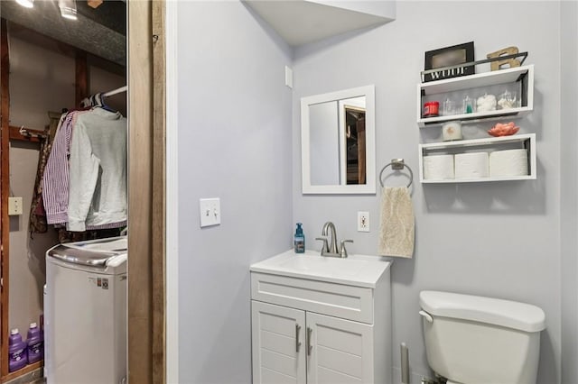 328 Chestnut Dr, Center Twp, PA 16001 - bathroom featuring washer / dryer and vanity