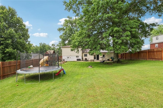 328 Chestnut Dr, Center Twp, PA 16001 - fenced backyard with a trampoline