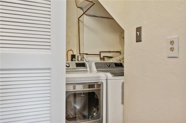 1314 Arrowood Dr, Mt Lebanon, PA 15243 - laundry area with separate washer and dryer and a textured wall
