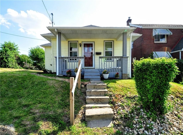 4632 Greensprings Ave, West Mifflin, PA 15122 - bungalow-style house with a front lawn, a porch, and a chimney