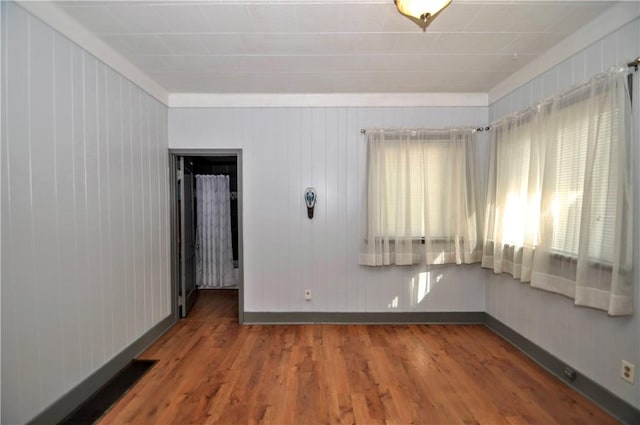 4632 Greensprings Ave, West Mifflin, PA 15122 - unfurnished room with wood finished floors and wooden walls