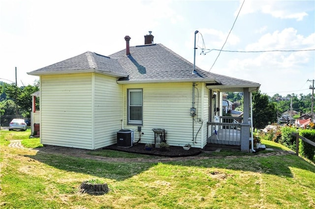 4632 Greensprings Ave, West Mifflin, PA 15122 - rear view of property with roof with shingles and a chimney