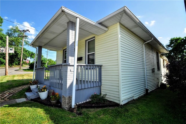 4632 Greensprings Ave, West Mifflin, PA 15122 - view of side of property featuring covered porch and a lawn