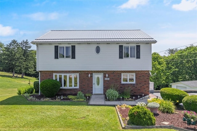 2812 Ridge Road Ext, Economy, PA 15005 - colonial inspired home featuring a front lawn, brick siding, and a metal roof