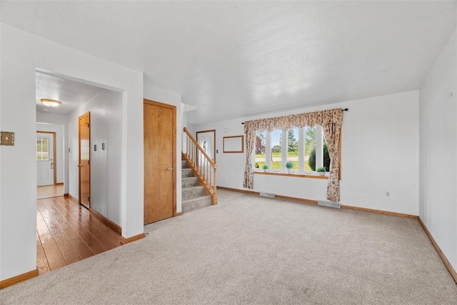 2812 Ridge Road Ext, Economy, PA 15005 - carpeted empty room featuring stairway and baseboards
