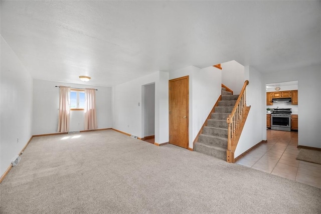2812 Ridge Road Ext, Economy, PA 15005 - unfurnished living room featuring light carpet and stairway