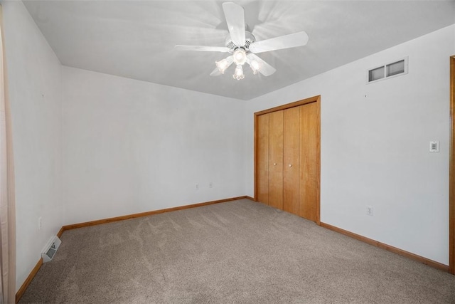 2812 Ridge Road Ext, Economy, PA 15005 - unfurnished bedroom with carpet floors, a closet, and a ceiling fan