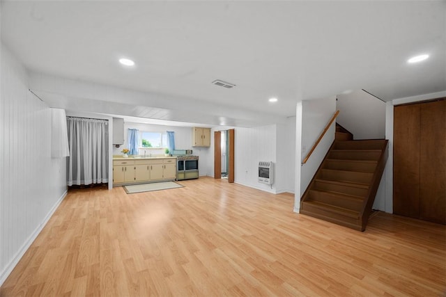 2812 Ridge Road Ext, Economy, PA 15005 - unfurnished living room with light wood-style flooring, heating unit, stairway, and recessed lighting