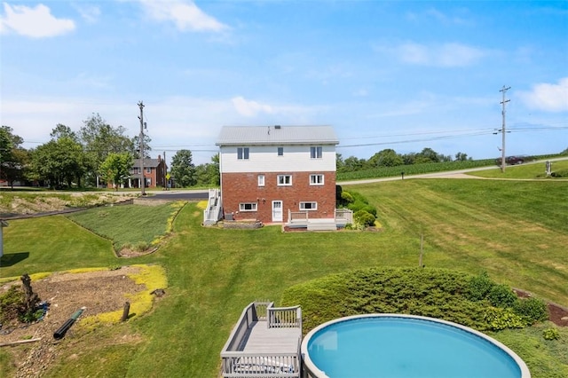 2812 Ridge Road Ext, Economy, PA 15005 - rear view of property featuring brick siding and a lawn