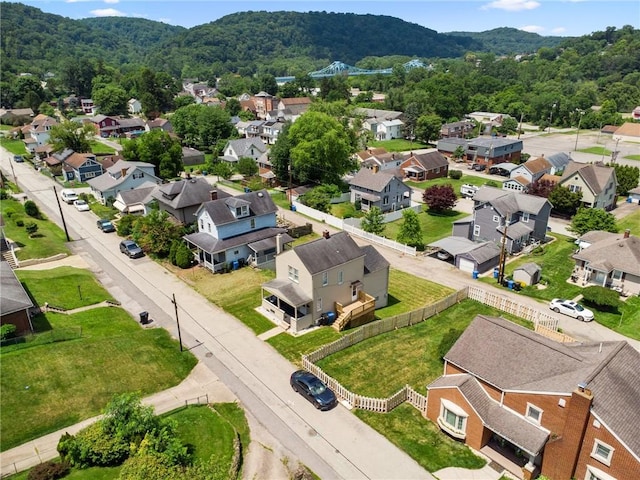 6017 Meade St, Elizabeth Twp/Boro, PA 15135 - aerial view of residential area featuring a mountain backdrop and a heavily wooded area