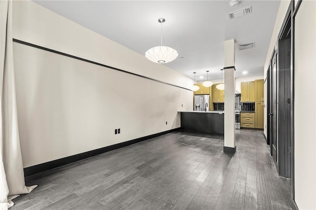 3725 Butler St Unit 306, Lawrenceville, PA 15201 - unfurnished living room with dark wood finished floors and baseboards