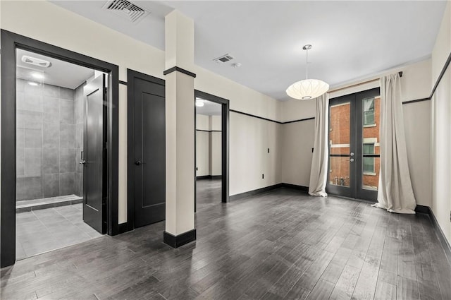 3725 Butler St Unit 306, Lawrenceville, PA 15201 - spare room featuring french doors and wood finished floors