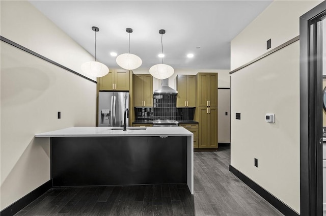 3725 Butler St Unit 306, Lawrenceville, PA 15201 - kitchen with stainless steel appliances, dark wood-type flooring, recessed lighting, tasteful backsplash, and a peninsula