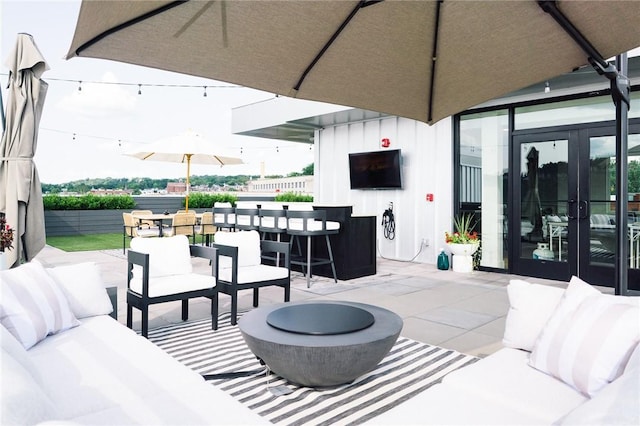 3725 Butler St Unit 306, Lawrenceville, PA 15201 - view of patio / terrace with french doors and outdoor lounge area