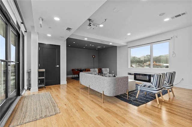 3725 Butler St Unit 306, Lawrenceville, PA 15201 - living room featuring light wood-style flooring and recessed lighting