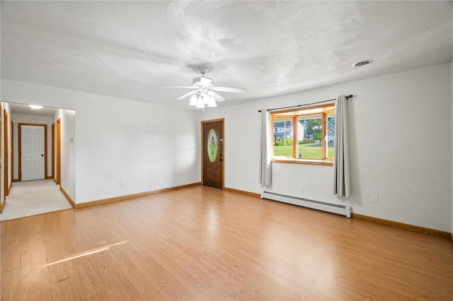156 Riemer Rd, Buffalo Twp, PA 16055 - unfurnished living room featuring baseboard heating, light wood-style flooring, and ceiling fan