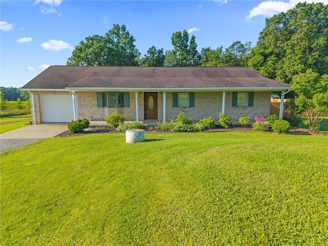 156 Riemer Rd, Buffalo Twp, PA 16055 - ranch-style house with an attached garage, concrete driveway, a front yard, and brick siding