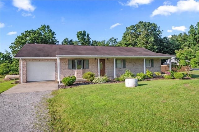 156 Riemer Rd, Buffalo Twp, PA 16055 - single story home with concrete driveway, a garage, and a front lawn