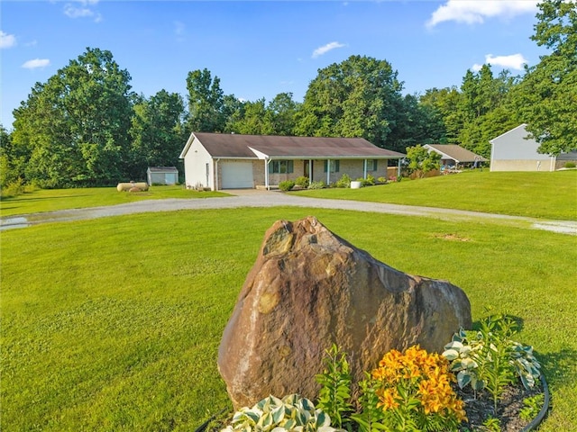 156 Riemer Rd, Buffalo Twp, PA 16055 - view of front of house featuring driveway, a front lawn, and a garage