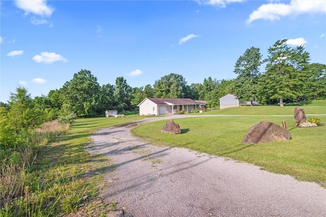 156 Riemer Rd, Buffalo Twp, PA 16055 - ranch-style house with driveway and a front yard