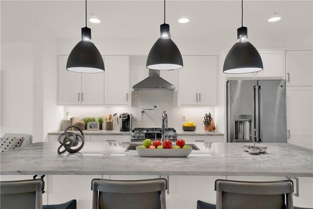 1817 Fox Way S, Side, PA 15203 - kitchen featuring stainless steel appliances, white cabinetry, tasteful backsplash, wall chimney range hood, and recessed lighting