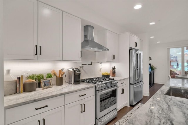 1817 Fox Way S, Side, PA 15203 - kitchen featuring wall chimney exhaust hood, high quality appliances, white cabinets, and recessed lighting