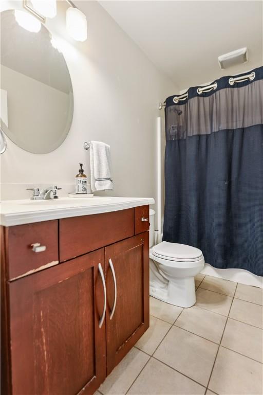 21 Enon Way S, Side, PA 15203 - full bathroom featuring vanity, tile patterned flooring, and a shower with shower curtain