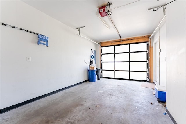 21 Enon Way S, Side, PA 15203 - garage featuring a garage door opener and baseboards