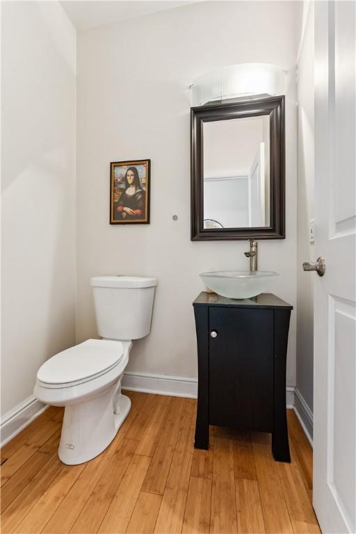 21 Enon Way S, Side, PA 15203 - bathroom with vanity and wood finished floors