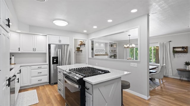 8609 Peters Rd, Cranberry Twp, PA 16066 - kitchen featuring stainless steel refrigerator with ice dispenser, gas range, light countertops, white cabinetry, and recessed lighting