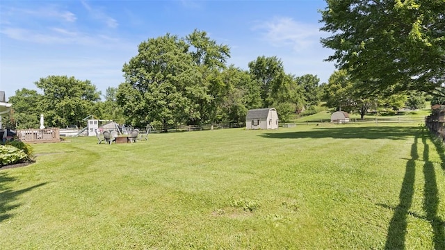 8609 Peters Rd, Cranberry Twp, PA 16066 - view of yard with a shed and view of scattered trees