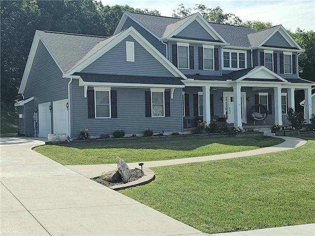 300 Crabapple Ln, North Sewickley Twp, PA 15010 - view of front facade with a porch, a front yard, concrete driveway, a garage, and a shingled roof
